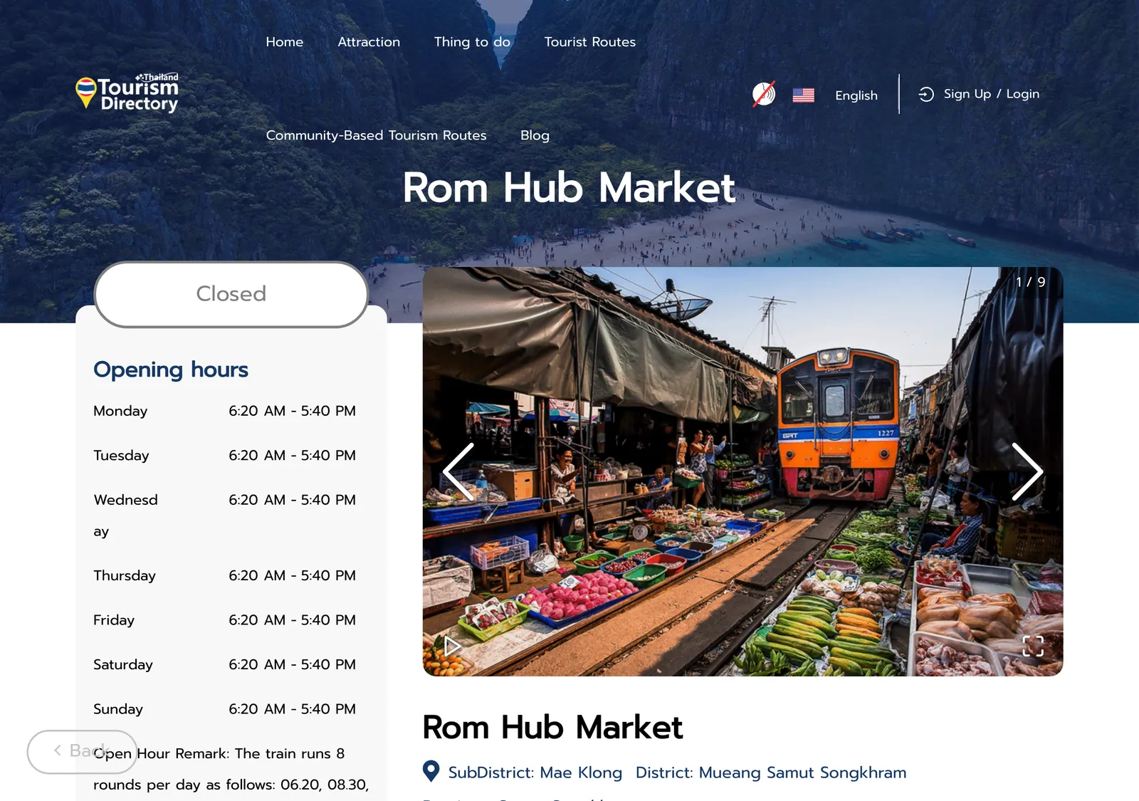 Government tourism directory page for Rom Hub Market with an opening hours list and a photo of a train passing market stalls.